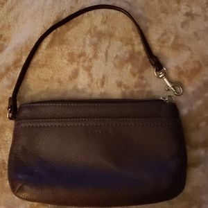 Coach 8x5 inch plum wristlet.